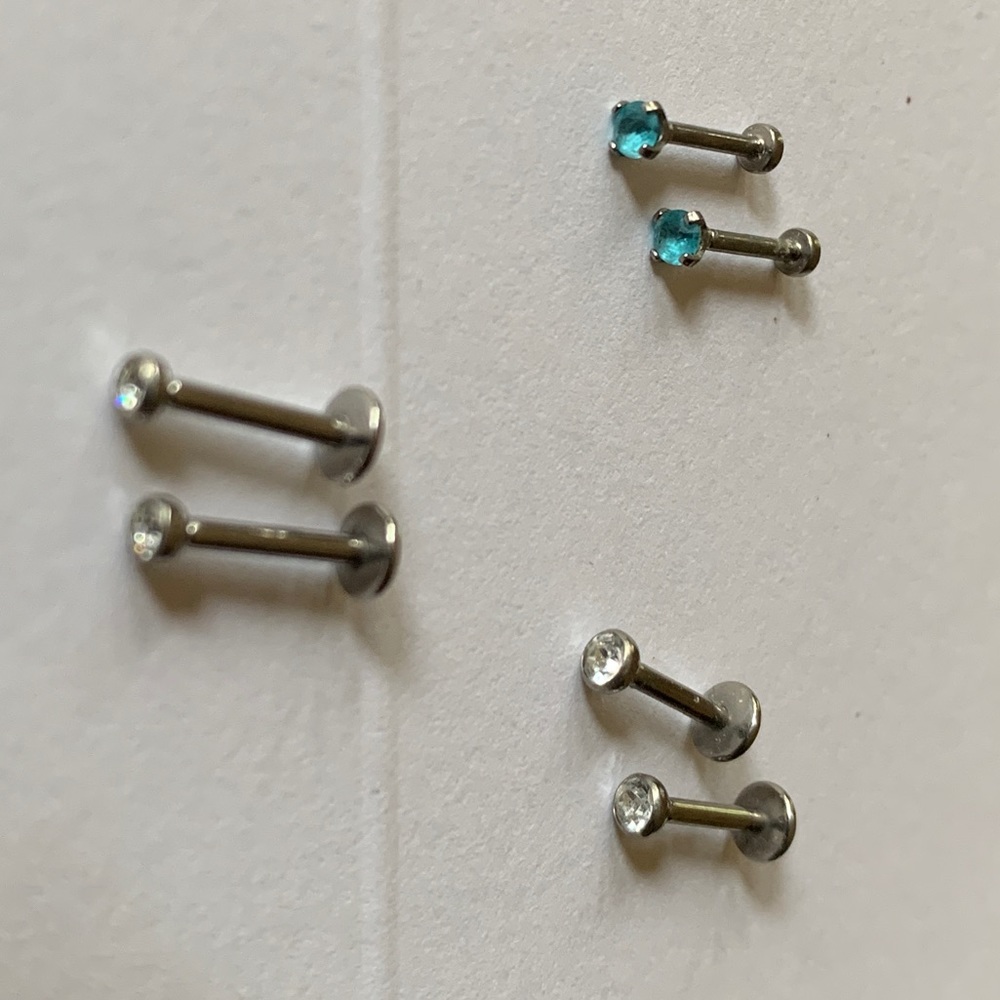3 pairs of titanium stud earrings from piercer